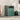 Green metal outdoor trash bin shed with hinged door and latch, panel sides and roof top