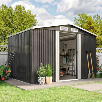 Black steel garden shed with open front door, gabled roof vents, and storage shelves