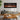 Black recessed electric fireplace with flame display and built-in control panel