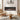 Wall recessed electric fireplace with black frame and orange flame effect