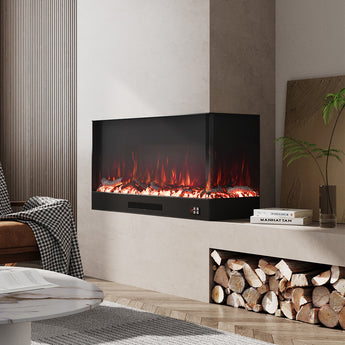Recessed electric fireplace with black firebox and white marble mantel, red flame with wood logs