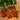 Set of four LED Christmas gift box decorations, red boxes with green ribbon, glowing