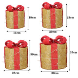 Four LED gift box size diagram: beige boxes with red ribbons, dimensions