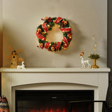 Decorative hanging Christmas wreath with red ribbon and gold ornament balls