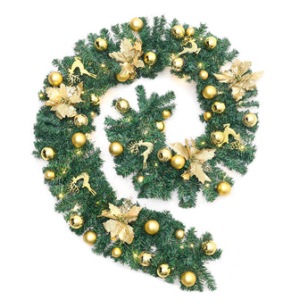 Gold holiday wreath with pine branches, gold ornaments, and small warm LED lights