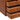 Close-up of wooden drawers with MERCERIE labels and curved cutout handles