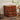 Wooden 4-drawer organizer with cutout drawer pulls and rustic brown finish
