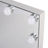 Close-up of LED light bulbs on rectangular vanity mirror frame