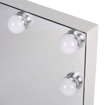 Close-up of LED light bulbs on rectangular vanity mirror frame