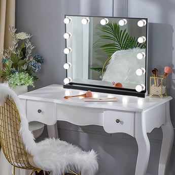 Rectangle LED makeup mirror with black frame and vertical bulbs, on vanity-style base