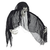Skull ghost hanging in black cloak, skeletal hands extended, light-up eyes