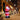 Inflatable Santa Claus yard decoration in red with white trim and black base