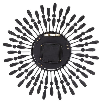 Black sunburst metal wall clock with drop-shaped accents and square center dial
