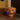 Spooky LED light-up pumpkin with bright blue glowing eyes and jagged mouth, orange textured
