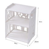 White 3-shelf bedside table with decorative cutout panels and open lower shelves