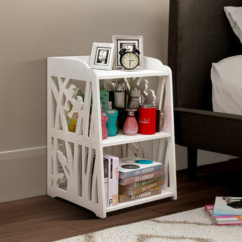 White rustic bedside table with decorative cutout sides and open 3-tier shelves
