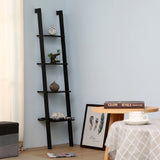 Black ladder-style wall shelf with four tiers, small plants and decorative vase