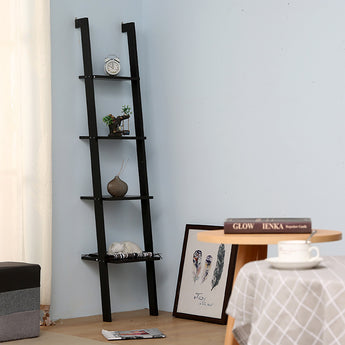 Black ladder-style wall shelf with four tiers, small plants and decorative vase