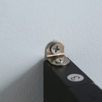 Metal wall-mount bracket with screw on black ladder shelf frame