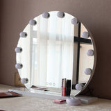 Frameless round Hollywood makeup mirror with LED bulbs, on light base