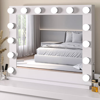 Tabletop makeup mirror with white frame and round bulbs around the edges