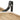 Black metal shelf bracket with arched support and mounting hole