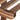 Weathered wood slat corner joint detail on rustic multi-tier plant stand