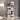 White wooden display ladder shelves with stacked open cubby tiers