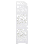 White 3-tier bookcase showing narrow side panel with ornate openwork cutouts