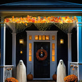 Hanging autumn maple leaf garland with warm LED lights, orange and red leaves