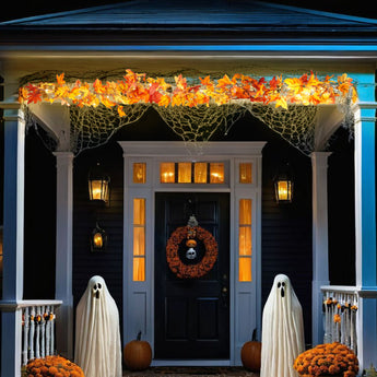Hanging autumn maple leaf garland with warm LED lights, orange and red leaves