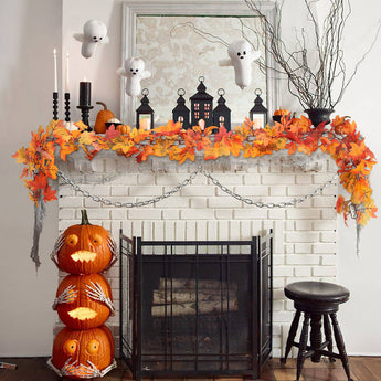 Maple leaf fall garland with warm LED lights and dangling leaf clusters on chain