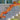 2 m maple leaf garland with lights, orange and yellow leaves along outdoor railing