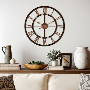 Round retro Roman numeral wall clock, black outer rim with bronze center and hands