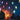 LED ghost string lights with glowing blue, pink, green and yellow ghost figures on cord
