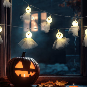 20 LED ghost string lights with glowing pumpkin-face heads and tulle tutu dresses