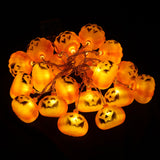 Halloween-Kürbis-LED-Lichterkette mit mehreren orangefarbenen Kürbis-Gesichtern