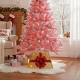 Pink Christmas tree collar basket with glittery bow, lit with warm lights