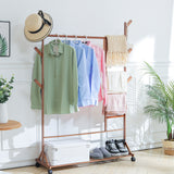 Natural wood bamboo clothes rack with hanging bar, side hooks, and lower storage shelf