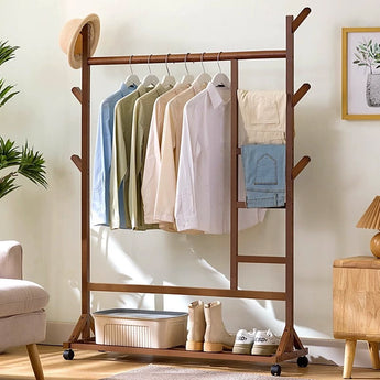 Brown bamboo clothes rack with hanging rail, side ladder shelves, rolling bottom shelf