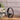Desktop metal statue figurine: man reading inside circular ornament frame