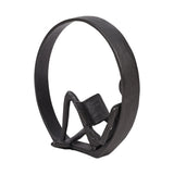 Metal desktop statue, man reading pose framed by dark oval ring