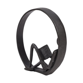 Metal desktop statue, man reading pose framed by dark oval ring