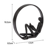 Size diagram: circular ornament metal statue of a man reading, 18.3cm x 17cm