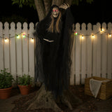 Hanging skeleton ghost figure with red eyes, blond hair strands, and black tattered cloak