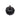 Black pumpkin ornament with brown stem, speckled white texture