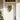 Pine swag LED garland with green pine leaves, gold ornaments, and warm LED lights