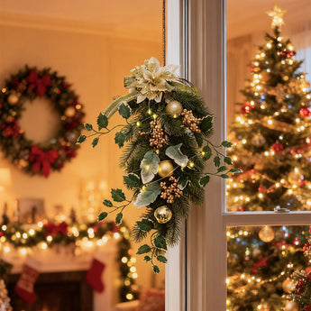 Pine swag LED garland with gold berries and warm glowing bulbs on pine foliage