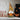 Handmade gnome decoration: plaid pointed hat with yellow flower and carved pumpkin