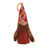 Thanksgiving gnome plush side view, red star hat and brown jacket with arms